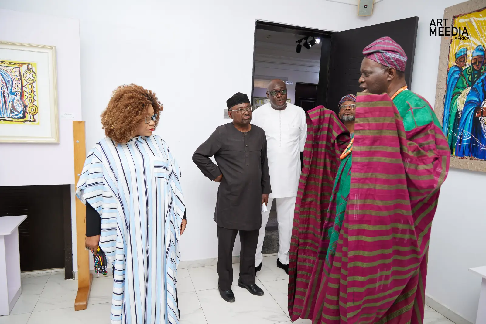 Dr. Kunle Adeyemi and Patrons at his exhibition